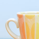 Squattie cup, Ellipse Stripes in Citrus